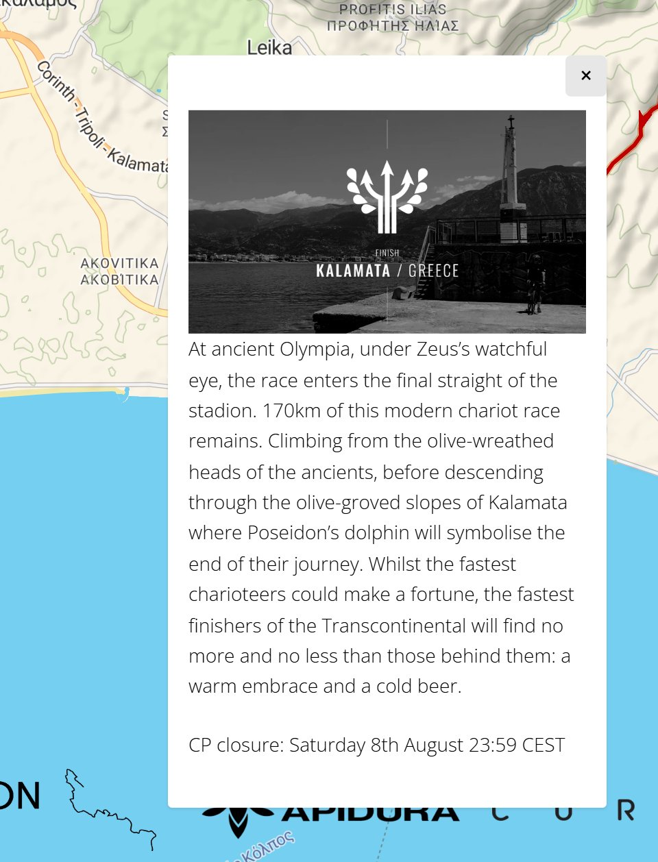 The Finish checkpoint pop-up on TCR No12 showing a photo of Kalamata harbour, a paragraph about the final stretch of the race and the CP closure time.