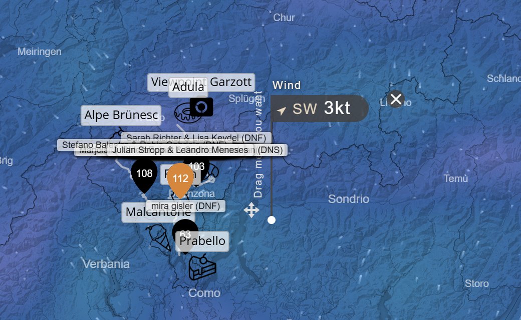 A Windy pin dropped on the map just east of the DED26 route and riders near Bellinzona, with a label reading Wind SW 3kt and the words Drag me if you want along the pin.